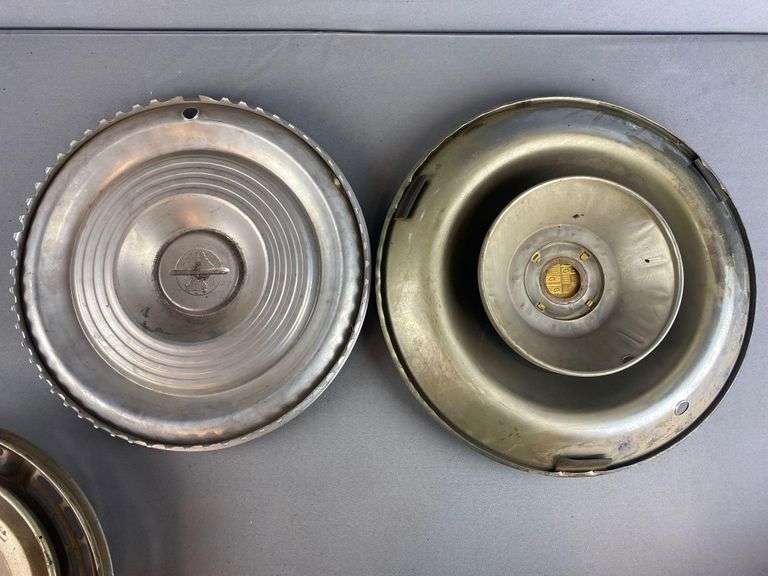 8 piece group of assorted hubcaps and trim rings Matthew Bullock