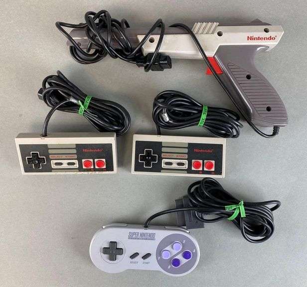 Group of 4 Assorted Nintendo Controllers Matthew Bullock Auctioneers