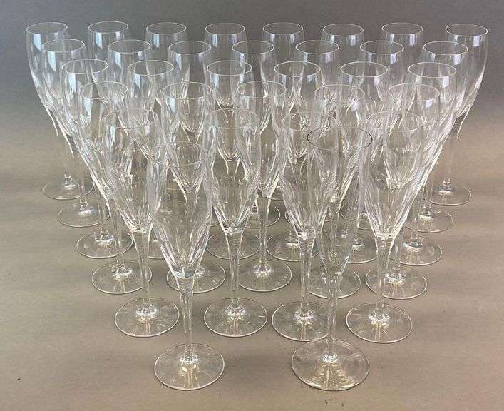 Group of 32 Clear Glass Champagne Flutes Matthew Bullock Auctioneers