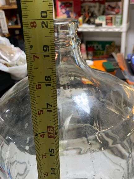 Large glass jug - McNatt Real Estate