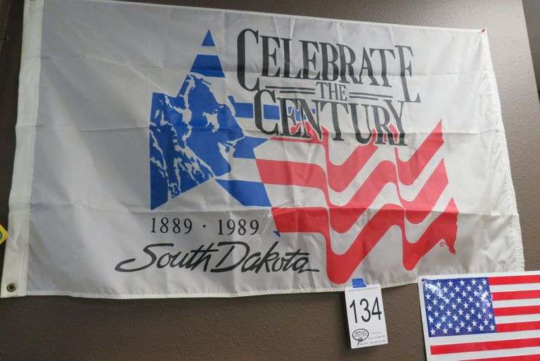 SOUTH DAKOTA CENTURY FLAG, TWO METAL SIGNS AND CHARLIE RUSSELL PRINTS