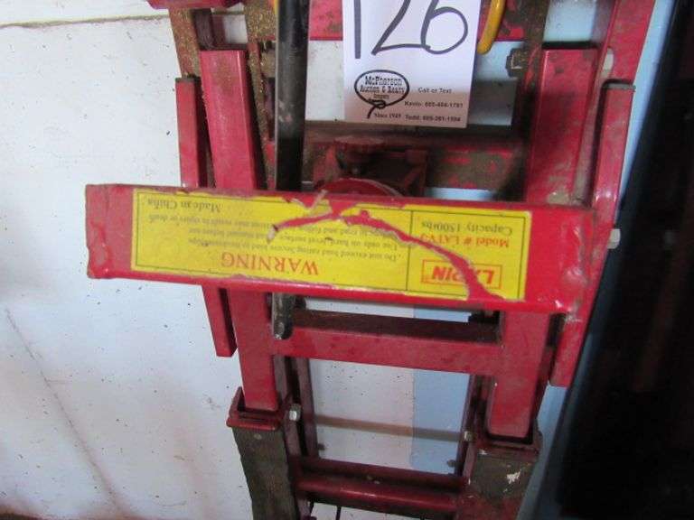 LARIN 1500 POUND CAPACITY MOTORCYCLE LIFT McPherson Auction & Realty