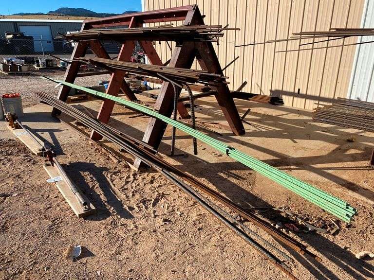 19 PIECES OF ASSORTED REBAR AND HEAVY REBAR / STEEL RACK McPherson Auction & Realty