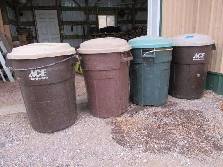 4 PLASTIC GARBAGE CANS WITH LIDS McPherson Auction & Realty