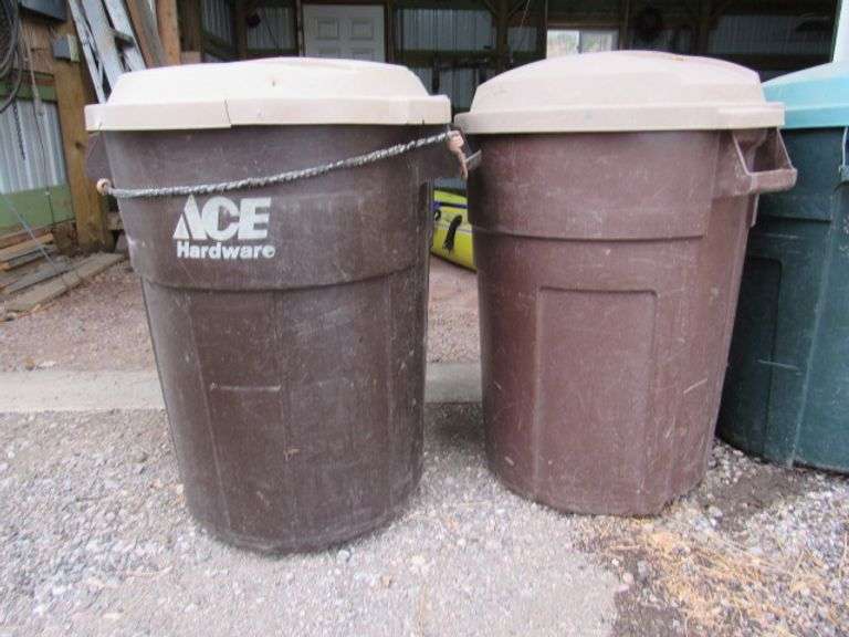 4 PLASTIC GARBAGE CANS WITH LIDS McPherson Auction & Realty
