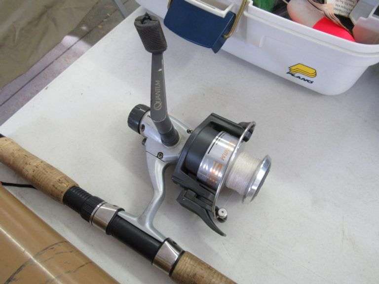 QUANTUM SPINNER FISHING POLE AND REEL McPherson Auction & Realty