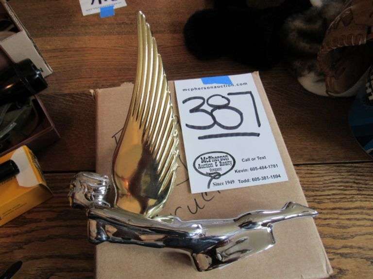 HOOD ORNAMENT REPRODUCTION McPherson Auction & Realty