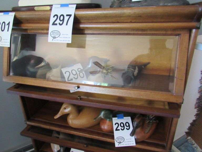 OAK BOOKCASE W/ 3 SHELVES ALL HAVE FLIP UP GLASS DOORS McPherson Auction & Realty