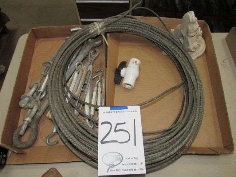 1 BOX OF TURNBUCKLES AND CABLE McPherson Auction & Realty