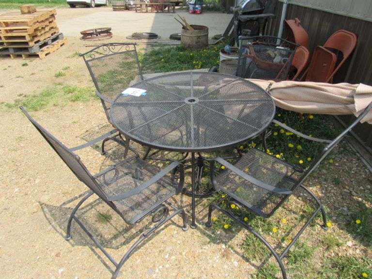 PATIO TABLE AND 4 MATCHING CHAIRS WITH UMBRELLA AND BASE McPherson Auction & Realty