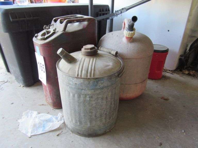 2 METAL AND 1 PLASTIC GAS CAN McPherson Auction & Realty
