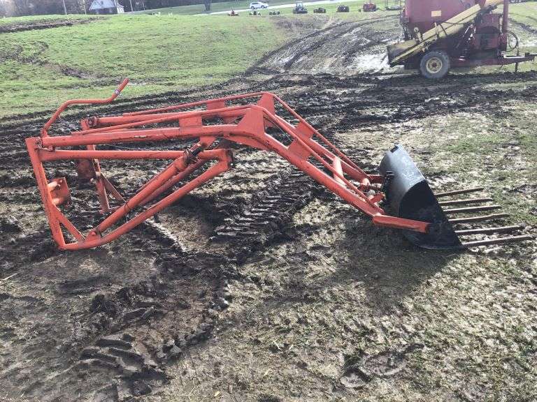 Trip bucket loader Metzger Property Services LLC