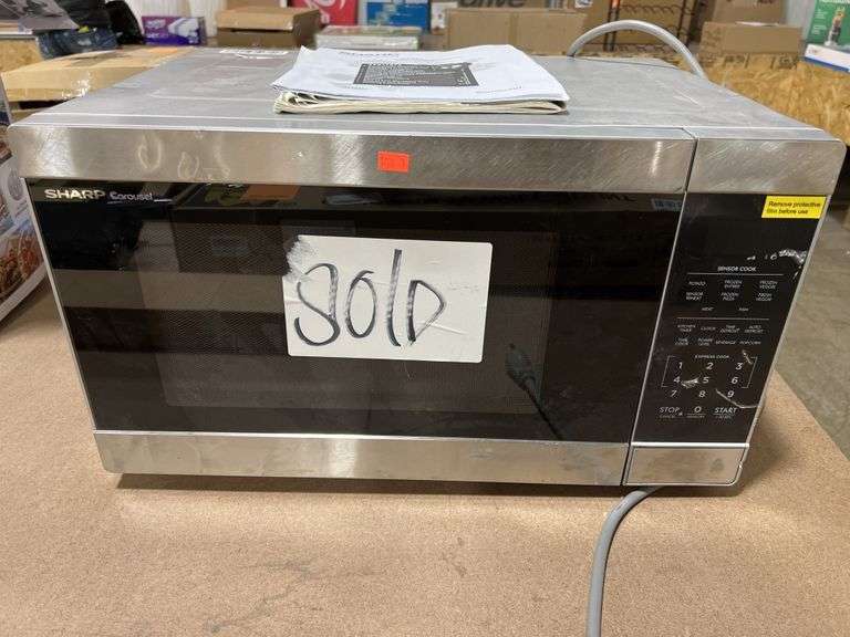 Sharp microwave ovenhas scratches and dingsmissing plate Metzger Property Services LLC