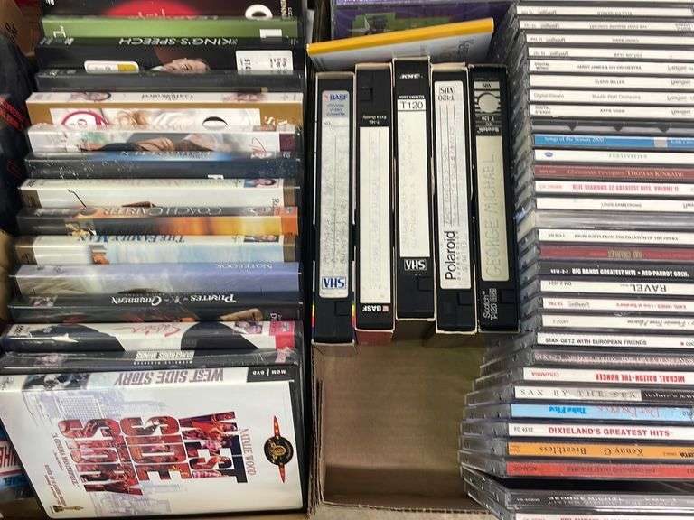 Assorted DVDs, VHS tapes & CDs 2 boxes Metzger Property Services LLC