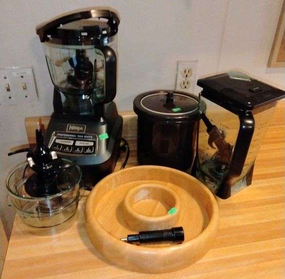 Ninja blender, Tupperware canister, wood bowl Metzger Property
