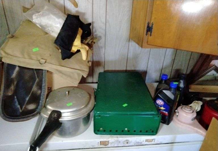Coleman camp stove, pressure cooker, oil, hair dryer, miscellaneous