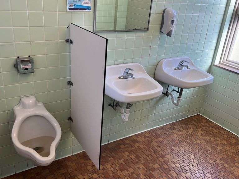 Men's restroom fixtures and stalls Metzger Property Services LLC