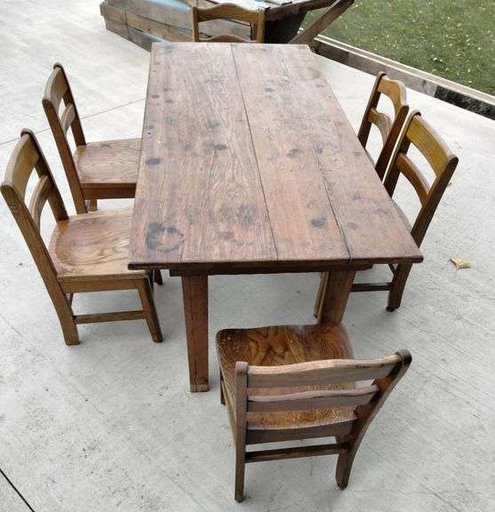 Child’s Oak table and 6 chairs Metzger Property Services LLC