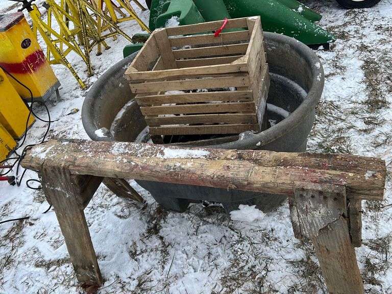 70 gallon Rubbermaid tank,wood crates ,saw horse Metzger Property