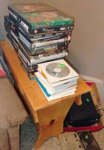 DVD assortment and table 11x24x21 - Metzger Property Services LLC