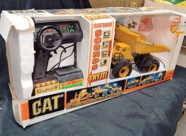 Caterpillar remote control dump truck Metzger Property Services LLC