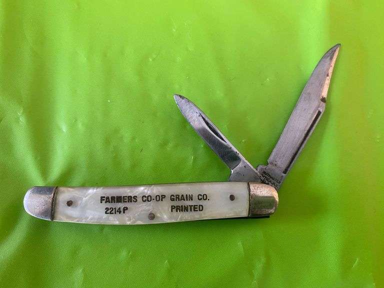 Farmers COOP Grain Co. pocket knife Metzger Property Services LLC