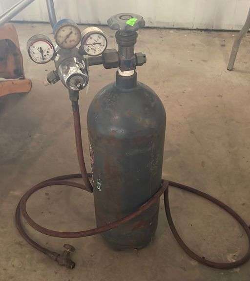 Carbon Dioxide tank with gauges and hose Metzger Property Services LLC