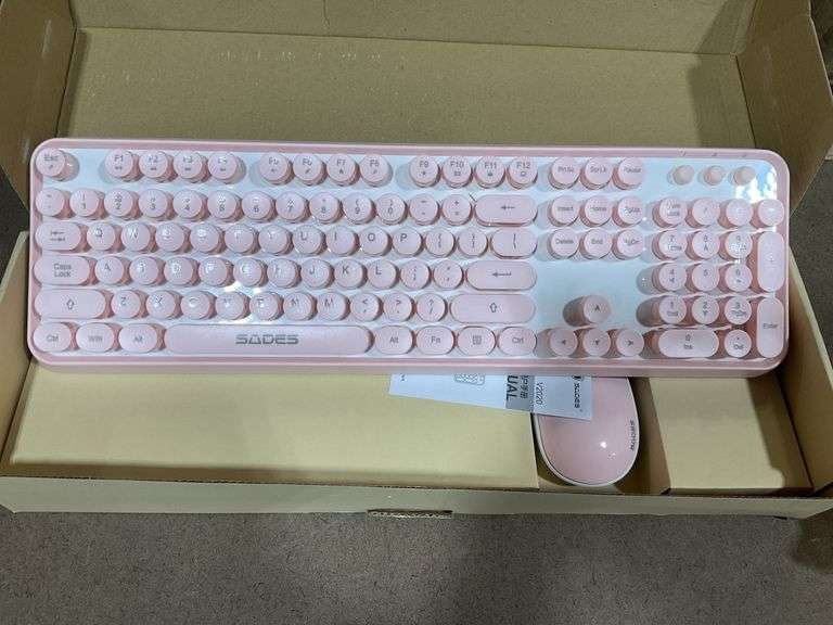 Pink keyboard and mouse combo Metzger Property Services LLC