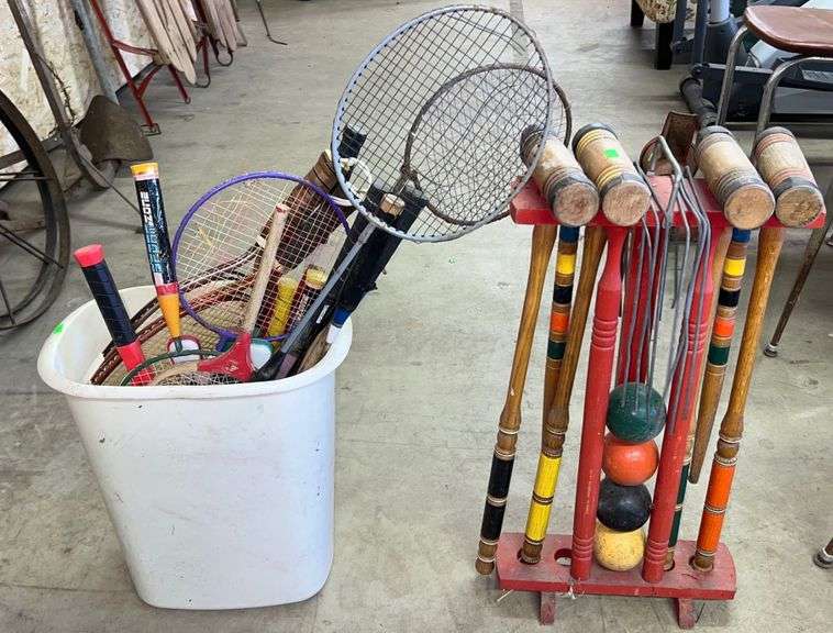 Croquet set, badminton & racquet ball rackets and trash can Metzger