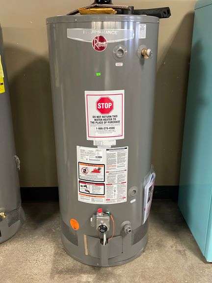Rheem 75 gallon LP gas water heater 75,100BTU model XP75T06ST76U0 - Metzger  Property Services LLC