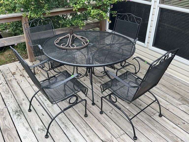 Metal patio table, 48 inch diameter, for rocking metal patio chairs