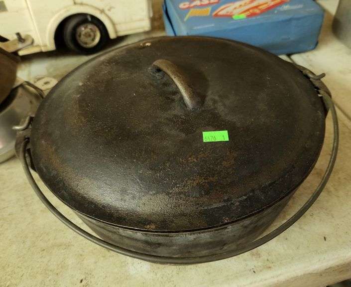 11" castiron Dutch oven Metzger Property Services LLC