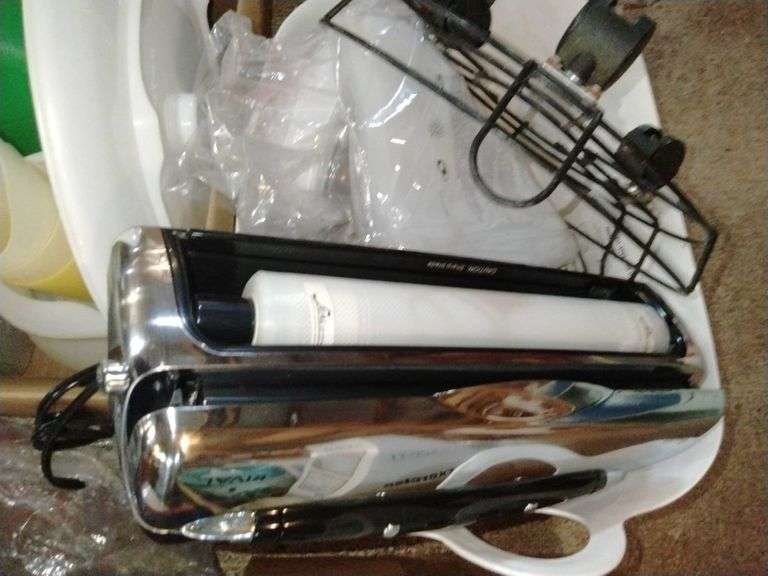 Rival vacuum sealer, plasticware Metzger Property Services LLC