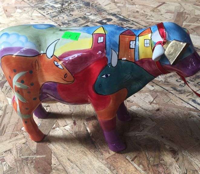 Ceramic cow bank Metzger Property Services LLC