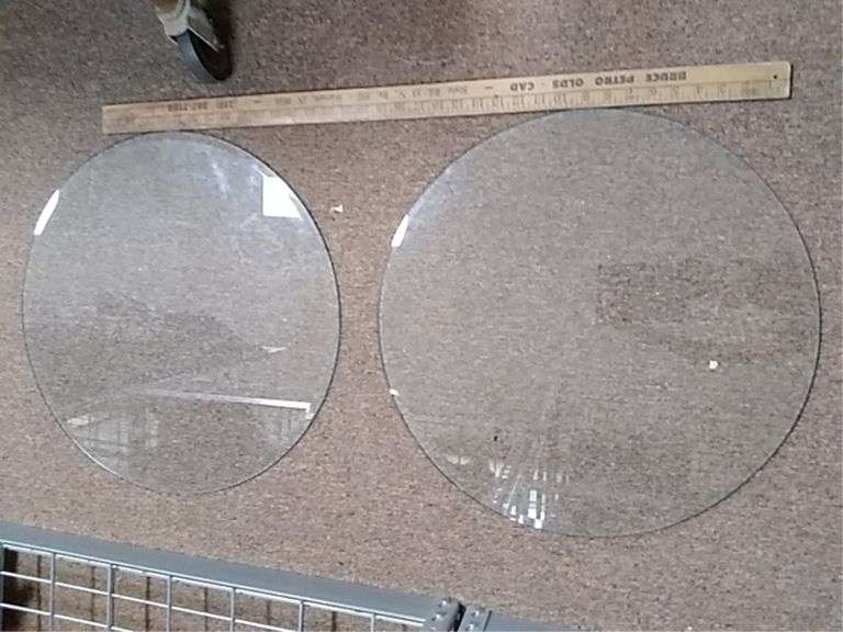 Two beveled Edge glass table tops, approximately 21 in diameter