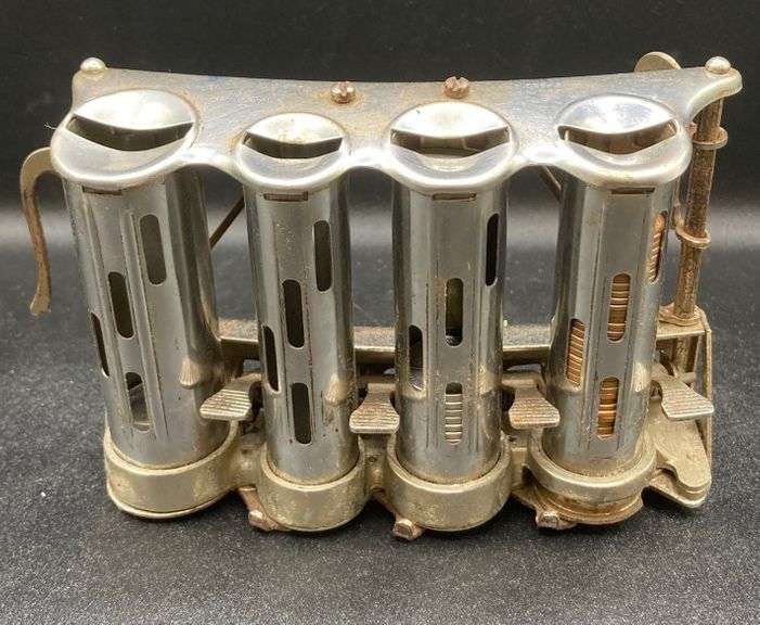 Vintage Belt Coin Dispenser Metzger Property Services LLC