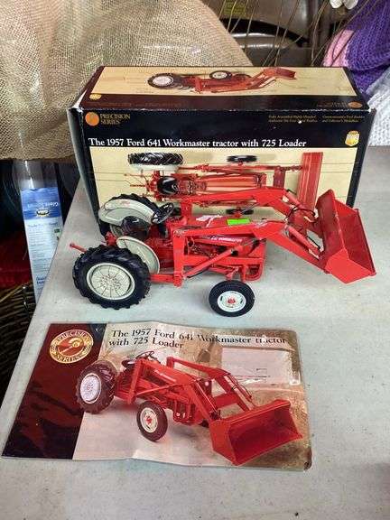 The 1957 Ford 641 Workmaster Tractor with 725 Loader with box - 12.35