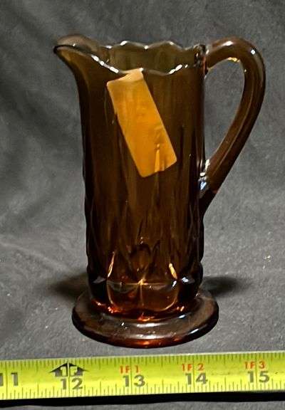 Amber glass syrup pitcher, 5in