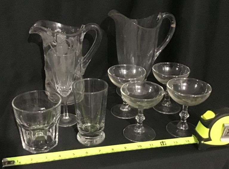 Clear, pattern glass pitchers and stemware assortment