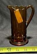Amber glass syrup pitcher, 5in