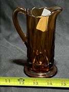 Amber glass syrup pitcher, 5in