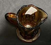 Amber glass syrup pitcher, 5in
