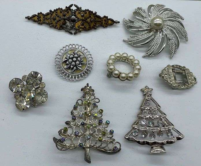Costume jewelry pin and brooch assortment including Sarah Coventry