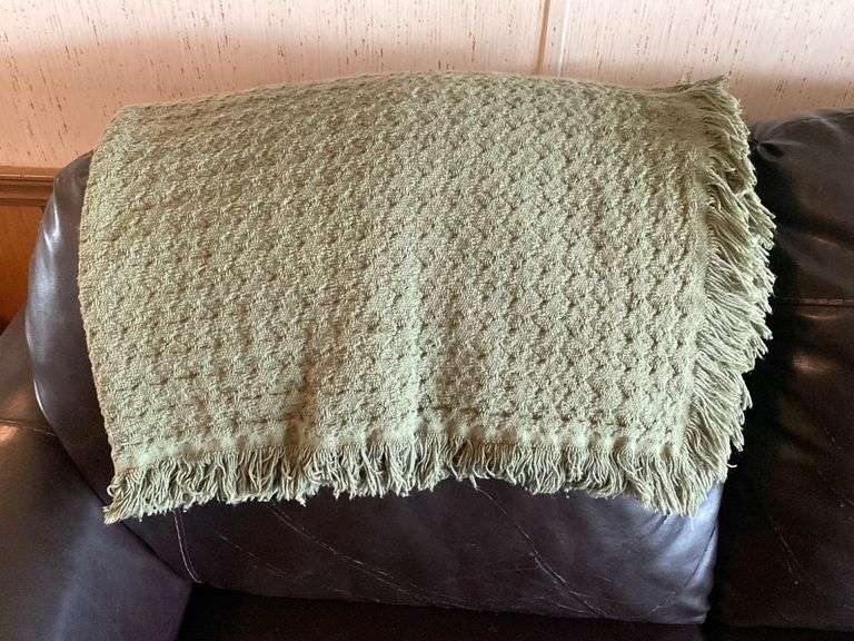 Leather couch 87”, pillows, blankets Metzger Property Services LLC