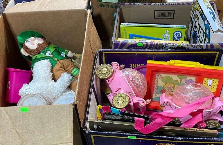 Children’s toy assortment including board games, matching game, stuffed