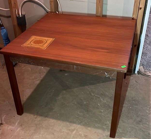 Teak wood side table 27x27x20 Metzger Property Services LLC