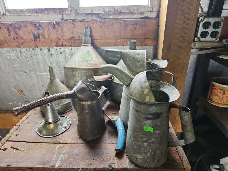 Galvanized oil cans and funnels Metzger Property Services LLC