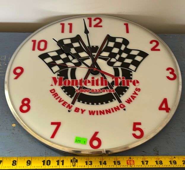 Monteith Tire clock 15” Metzger Property Services, LLC