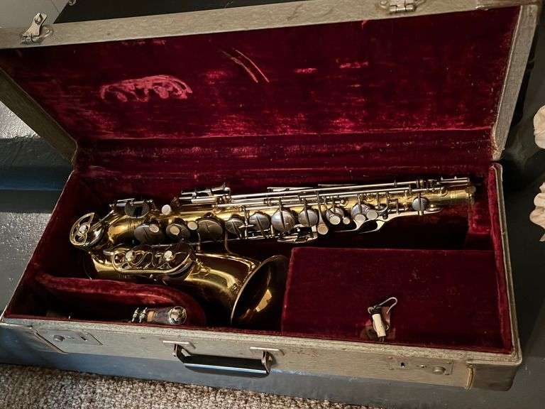 Paris France Saxophone Metzger Property Services, LLC