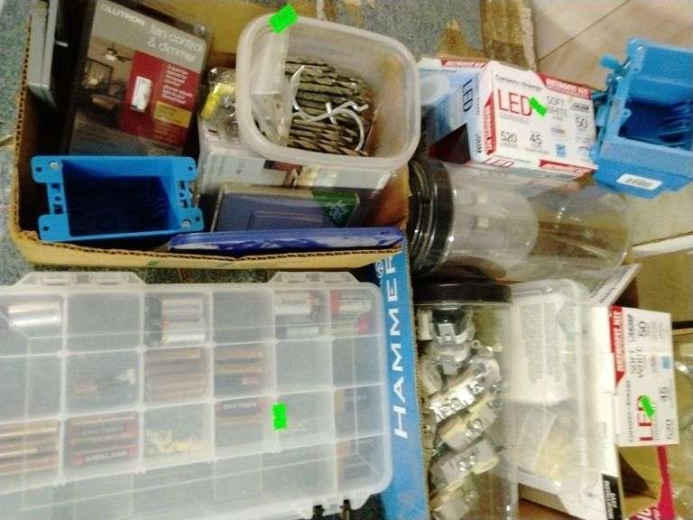 Forearm forklift, glue gun, levels, hooks, tools, batteries, drill bits